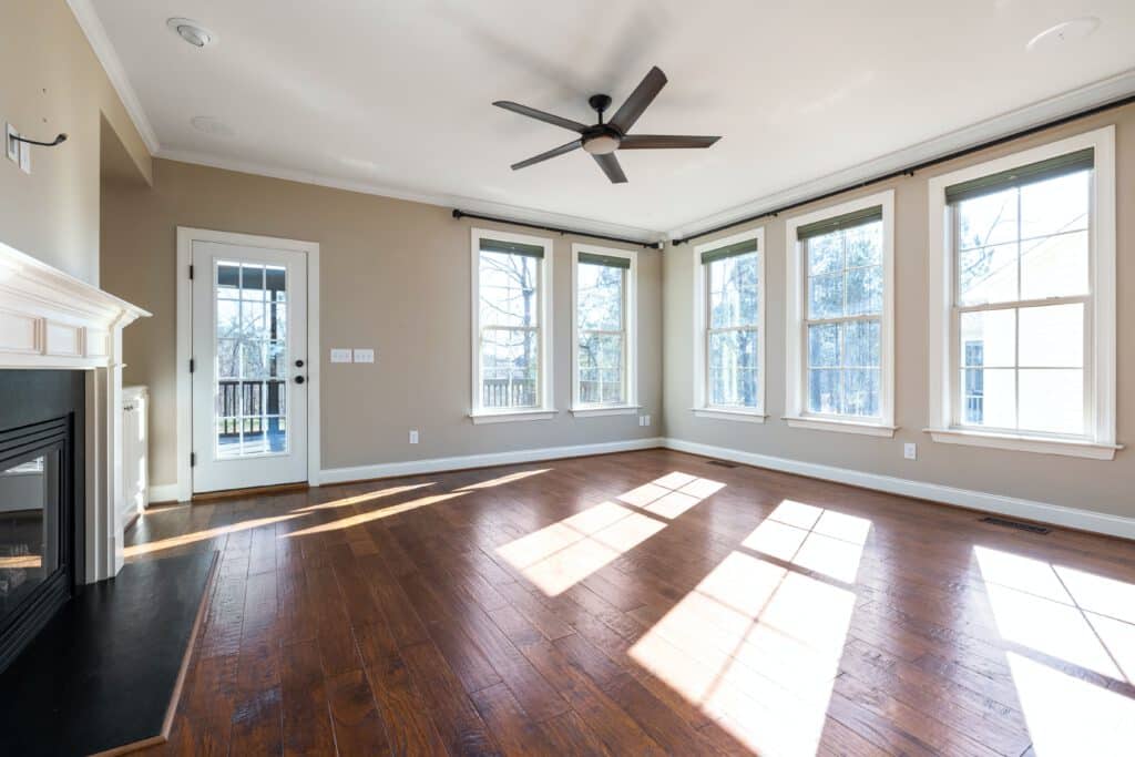 Dark hardwood floors with natural light