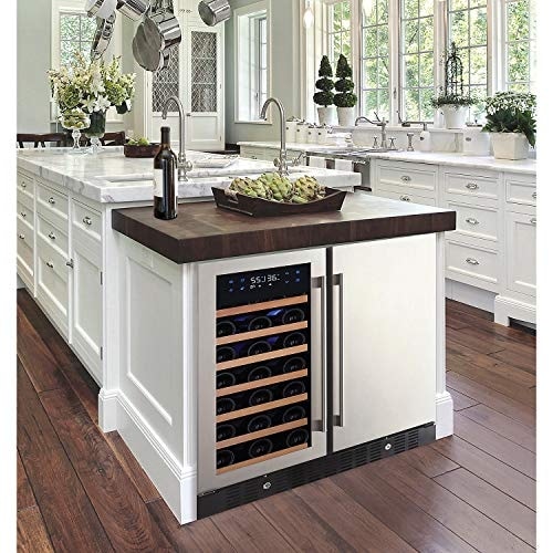 Under-counter wine fridge in a white island with wood countertop