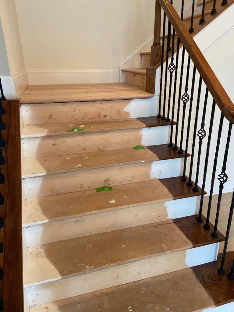 Stairs with carpet removed, ready for stain to be removed