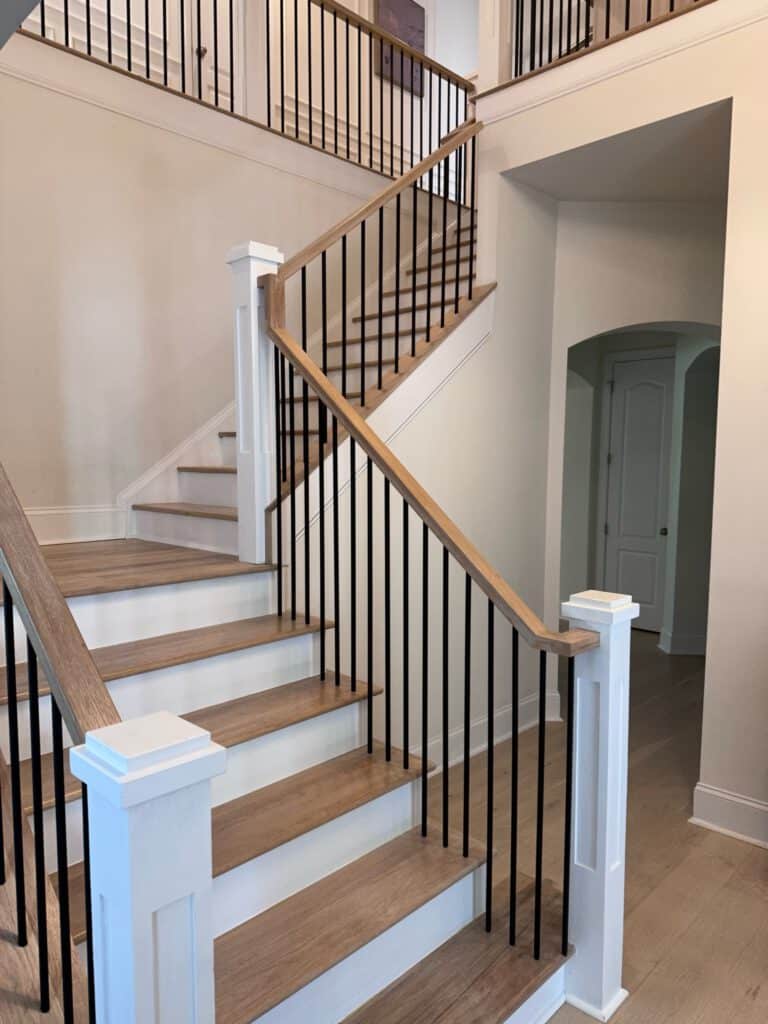 Renovated staircase with white oak treads and banisters