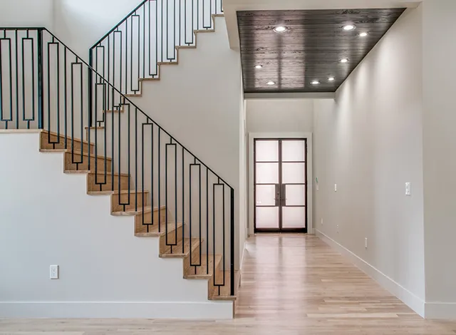 Elegant Stairs With Intricate Box Shaped Metal Balusters Design