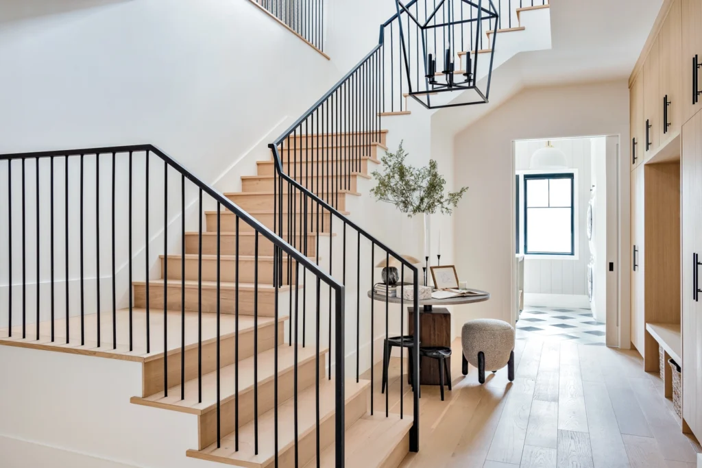 Modern Hardwood Stairs With Light Wood Staircase And Black Metal Railing