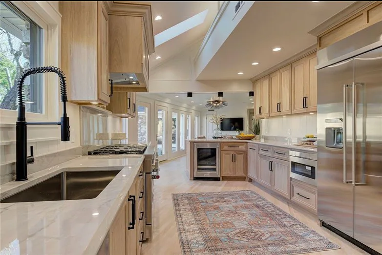 Farmhouse black hardware on white oak cabinets