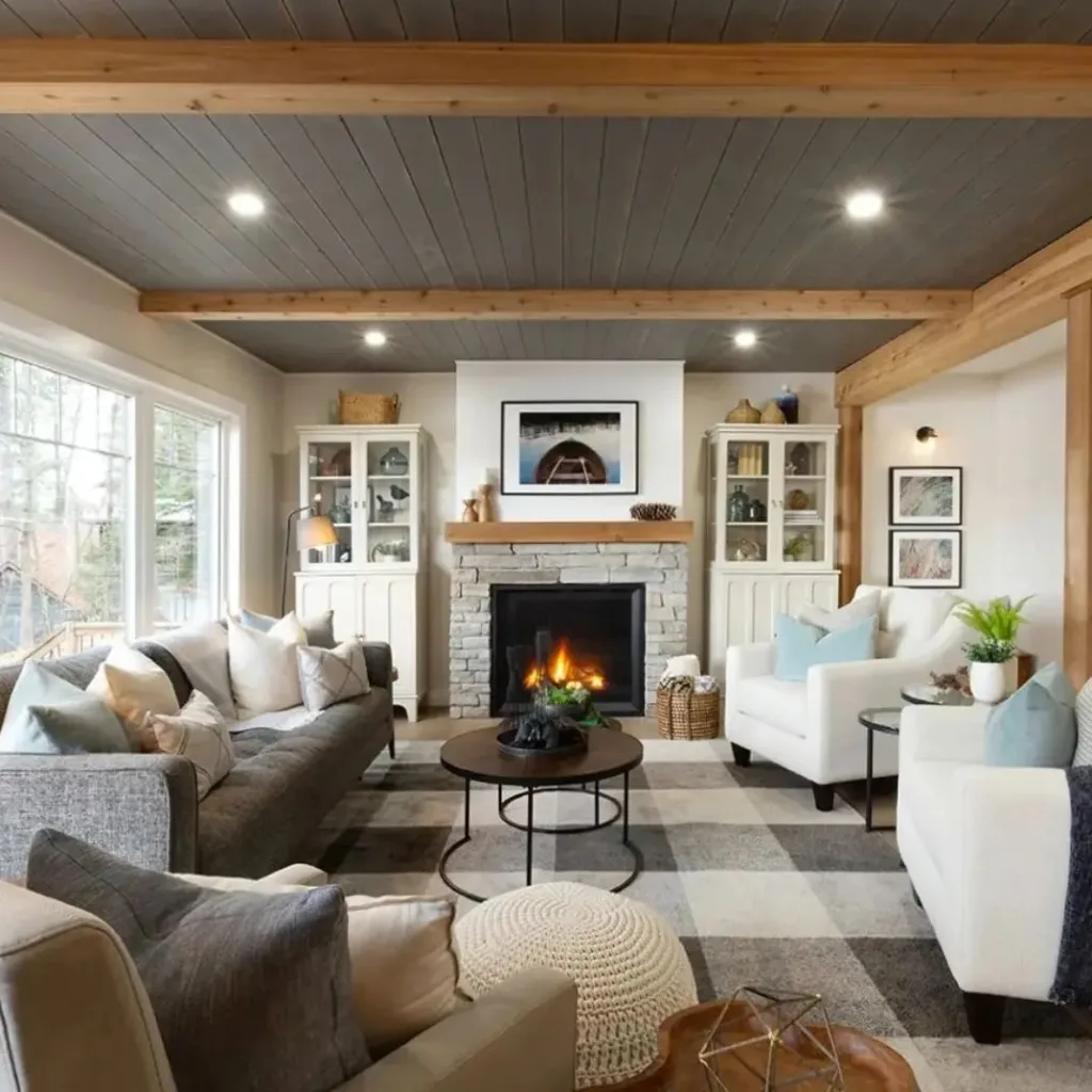 Grey shiplap ceiling with light brown beams 