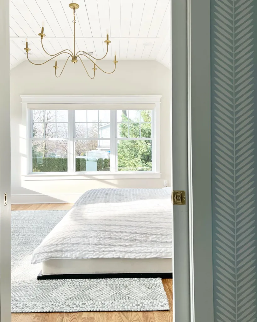Bedroom with a vaulted shiplap ceiling