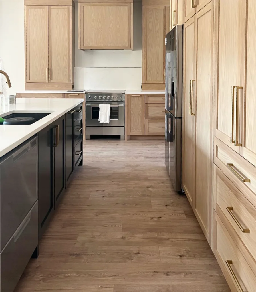 White oak cabinets with stainless stell appliances