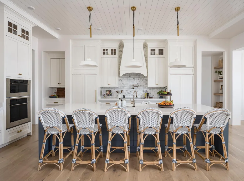 Navy island with a white shiplap kitchen ceiling