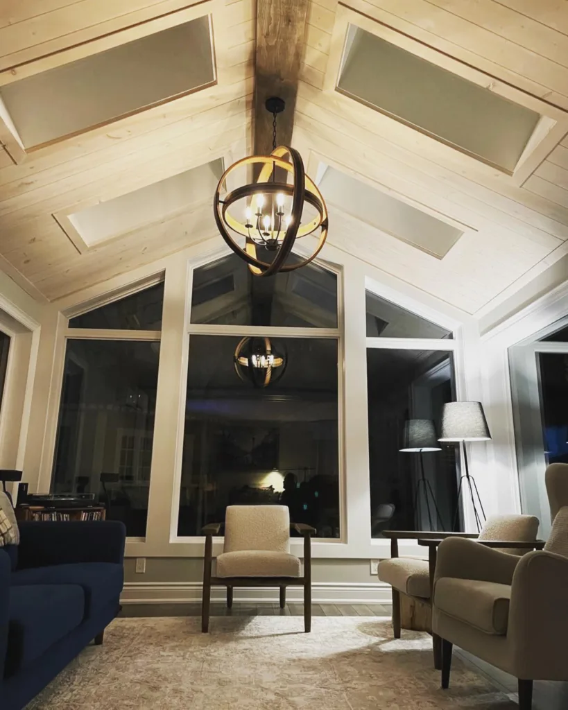 Light wood shiplap ceiling in a white living room