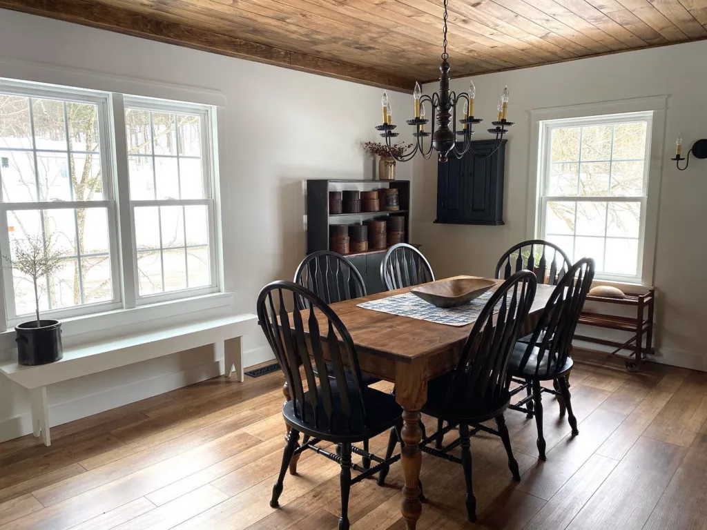 Rustic wood shiplap ceiling in a small dining room