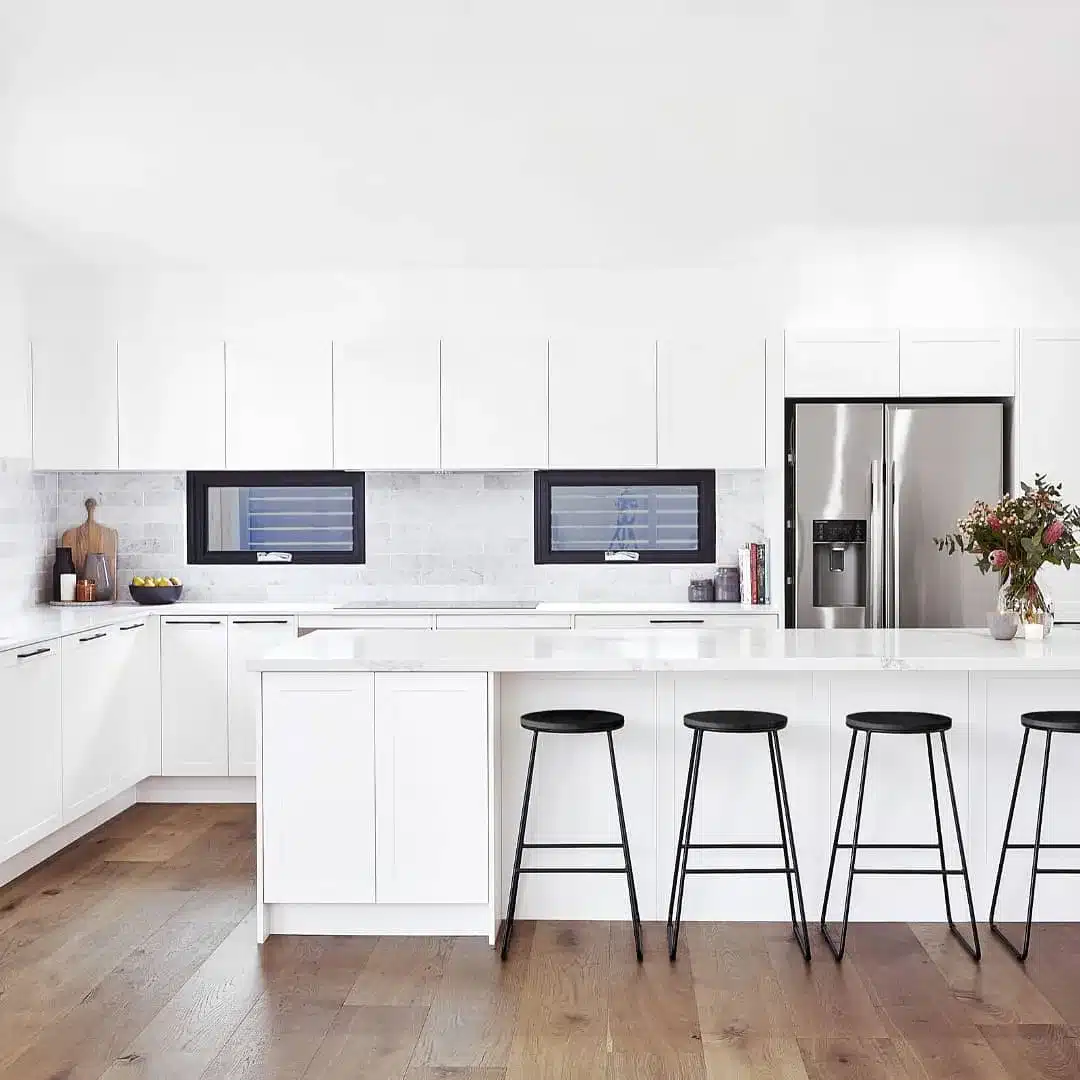 White L-Shaped Kitchen with Island