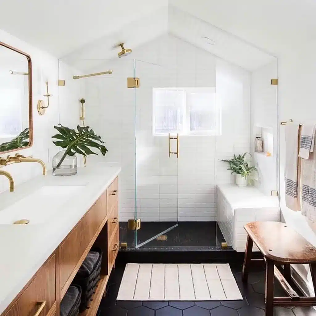 38 Bathrooms With Hexagon Tile Floors 2 Black Floor And White Walls In A Bathroom With A Glass Shower And Gold Accents