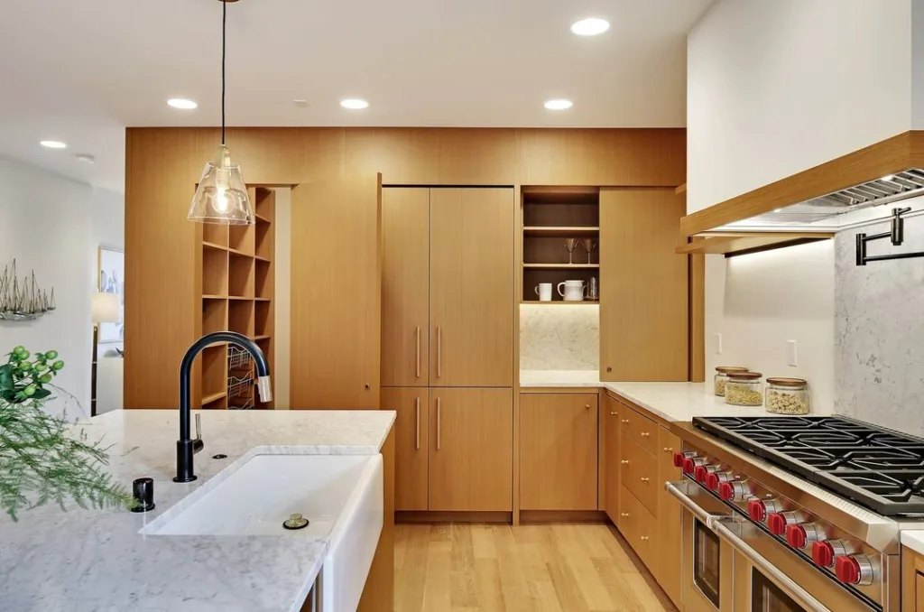 32 Floor To Ceiling Cabinets Ideas To Maximize Storage 27 Kitchen Features Custom Inset Cabinets Clad In Teak To Mimic The Look Of Floor-To-Ceiling Built-Ins For A Sleek, Modern Space.