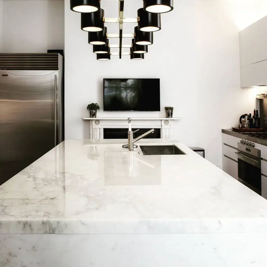32 Waterfall Kitchen Island Ideas For Inspiration 21 A Waterfall Edge Marble Countertop With Straight Cut Edges That Show A Seam