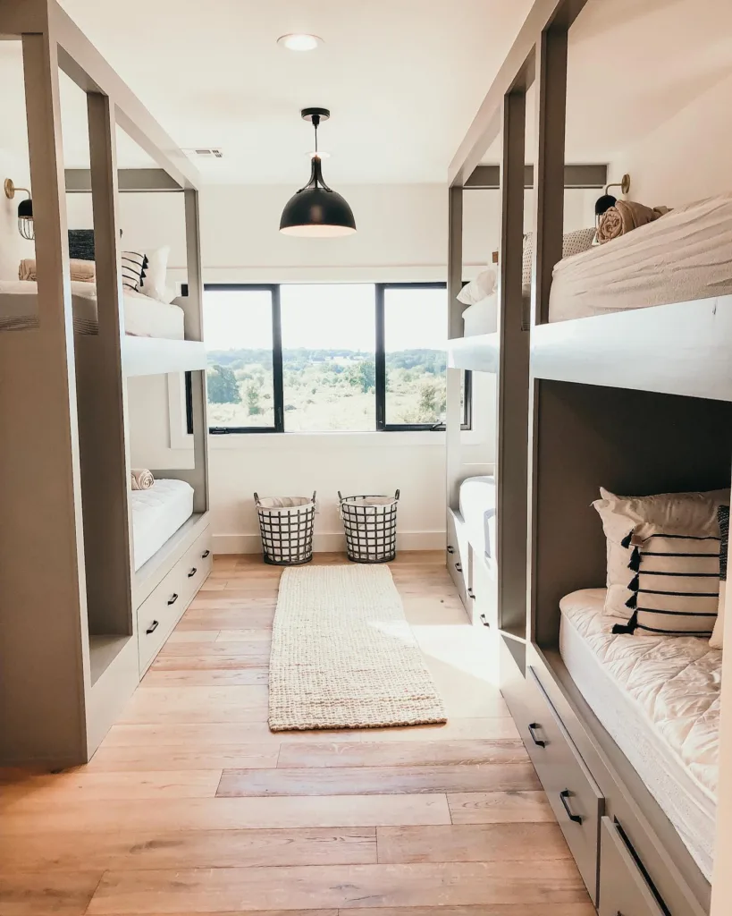 33 Built-In Bunk Beds To Upgrade Your Guest Rooms 16 A Modern Bunk Room With White Oak Furniture And Two Large Windows With Black Framing
