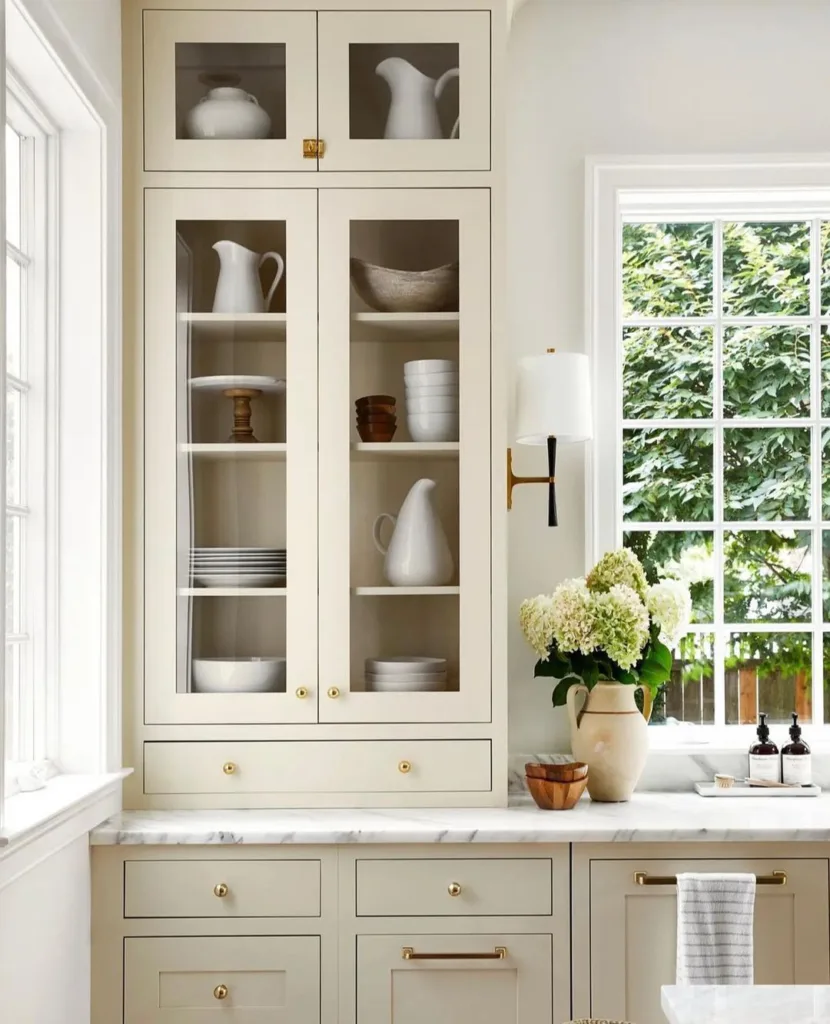 32 Floor To Ceiling Cabinets Ideas To Maximize Storage 18 The Natural Light, Warm Cabinets And Gold Hardware Are Stunning.