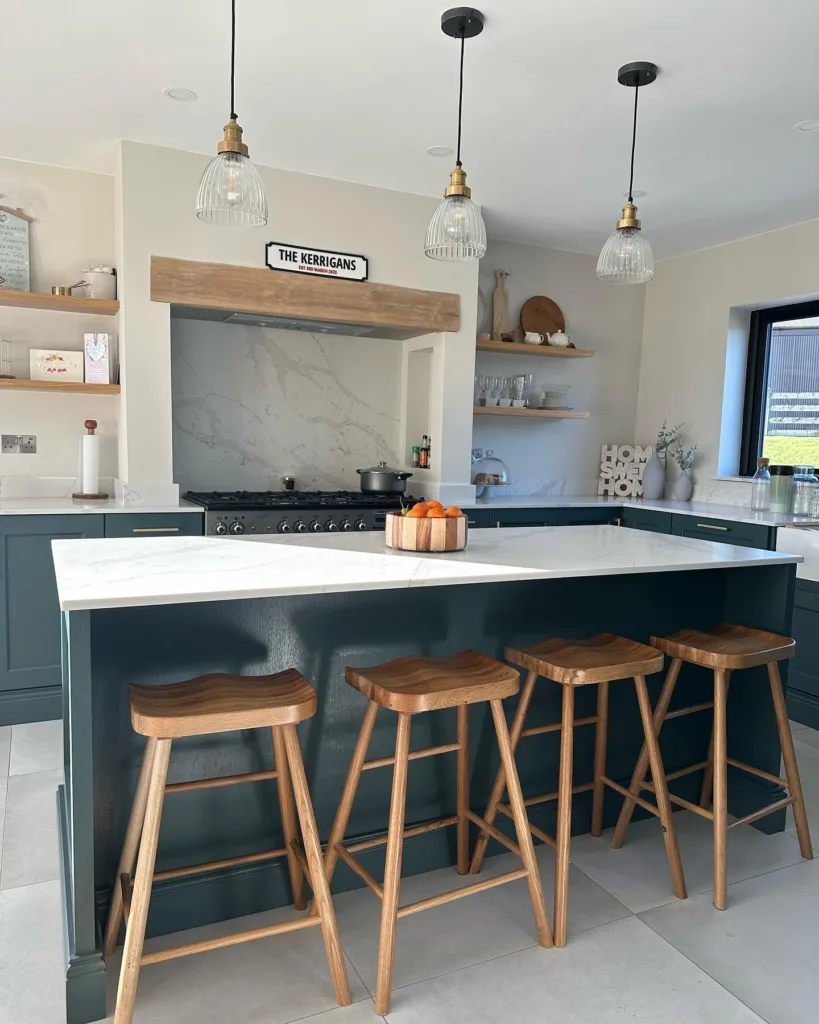 25 Teal Kitchen Cabinets Ideas 17 Dark Teal Cabinets In A Kitchen With A Matching Island And Wood Stools