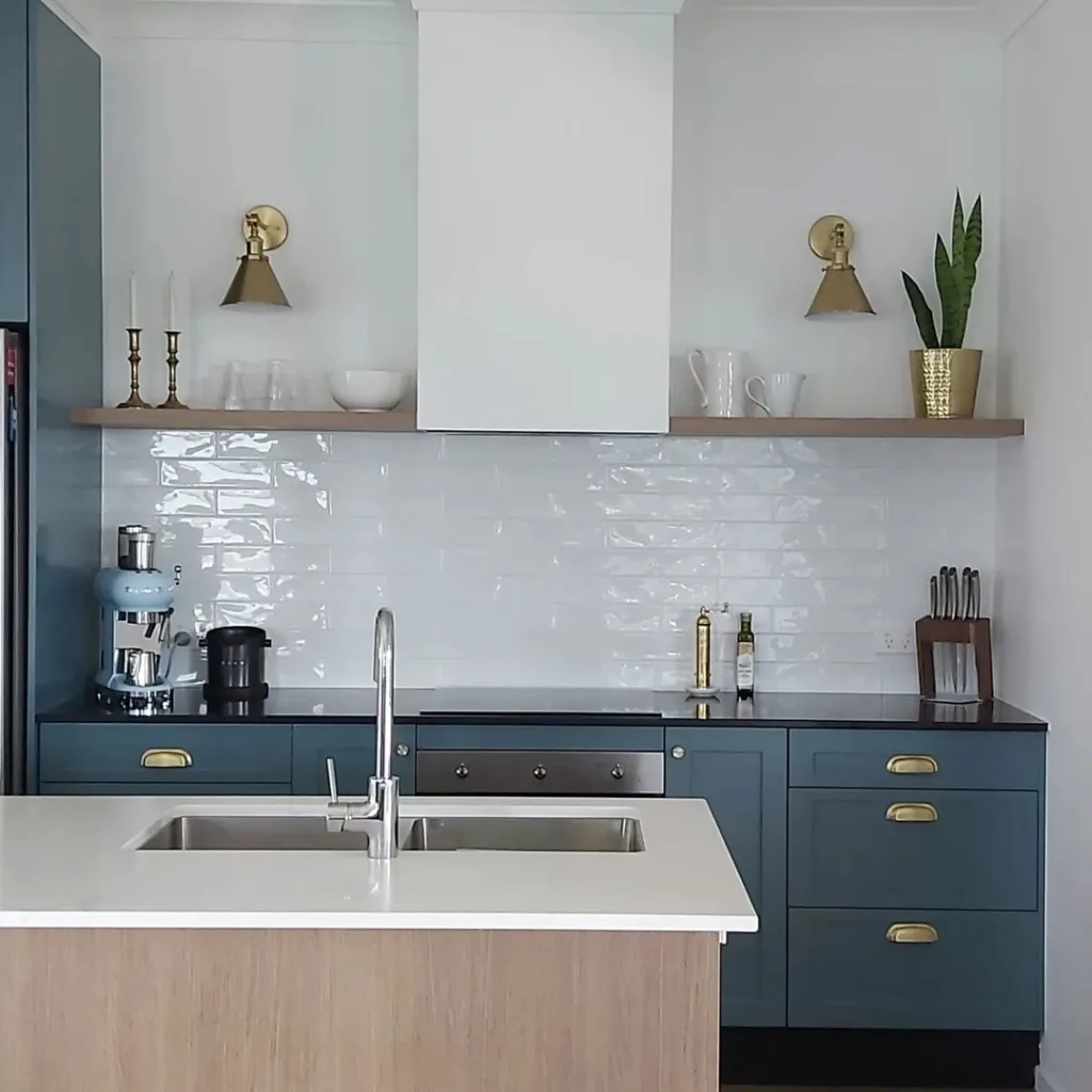 25 Teal Kitchen Cabinets Ideas 3 A Bright And Cheerful Teal Kitchen With Stainless Steel Appliances And White Countertops.