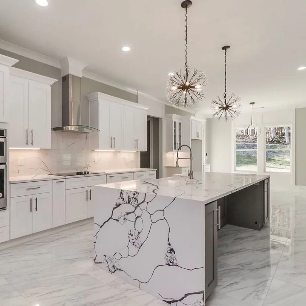 32 Waterfall Kitchen Island Ideas For Inspiration 32 Black Thin Veining In The White Countertop On This Waterfall Island In A Kitchen With White Polished Stone