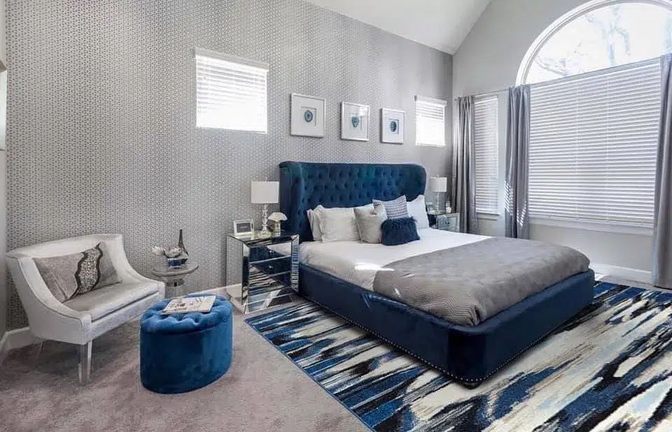 37 Rug Under Bed Ideas For A Stylish Bedroom 2 A Blue Bed Frame With Grey Bedding And A Modern Blue And Grey Rug Underneath