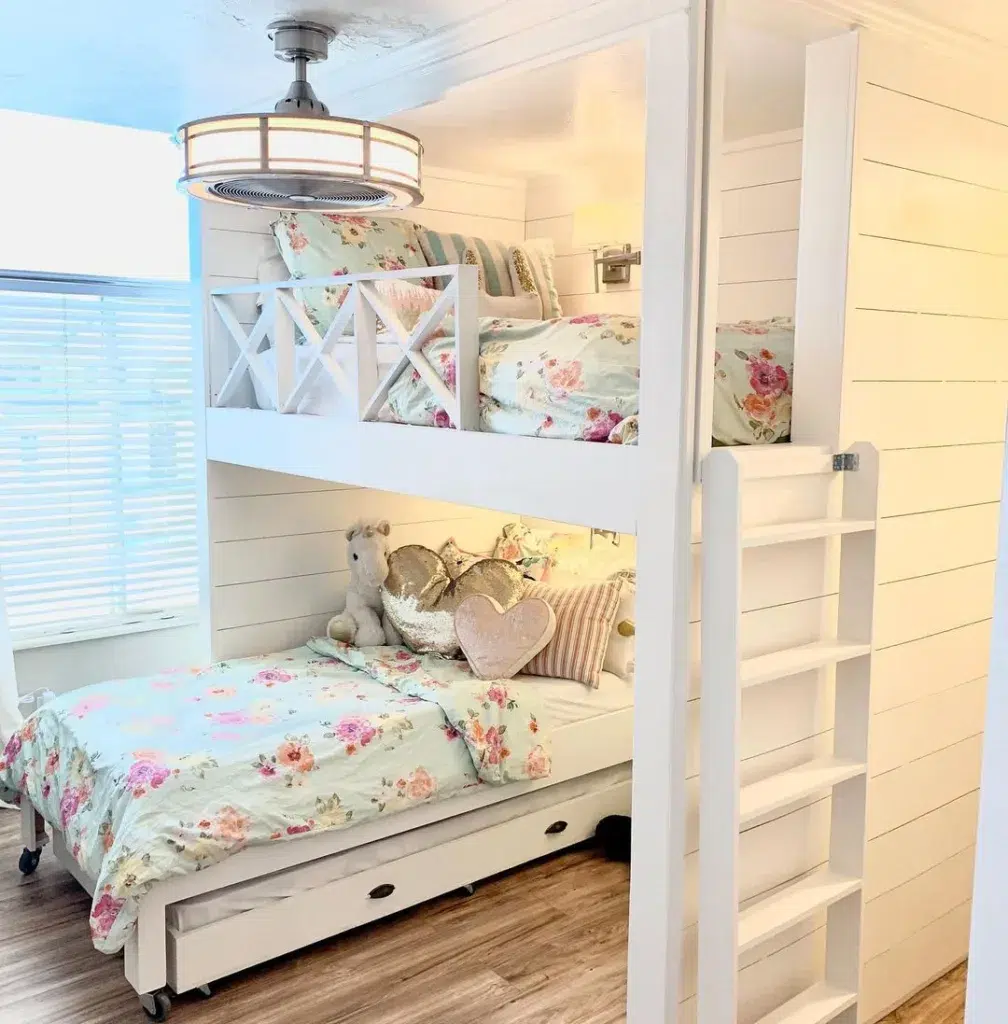 A Colorful Bunk Bed With Playful Bedding And Decor