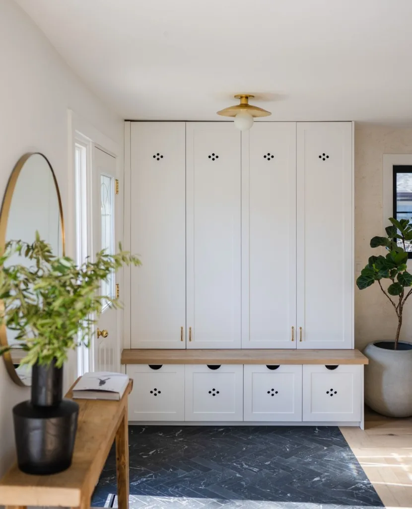 32 Floor To Ceiling Cabinets Ideas To Maximize Storage 28 These Floor-To-Ceiling Built In Storage Cabinets At Boulding Really Bring This Entrance To Life While Staying Functional.