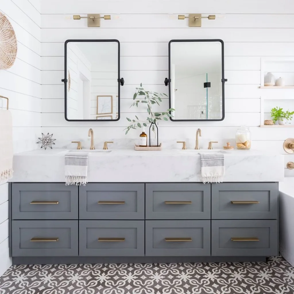 35 Bathroom Counter Decor Ideas 1 A Shaker Style Bathroom Vanity With A Shiplap Backsplash And Decor On The Counter