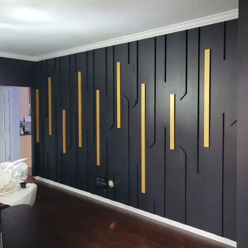 Black And Gold Accent Wall With Modern Trim