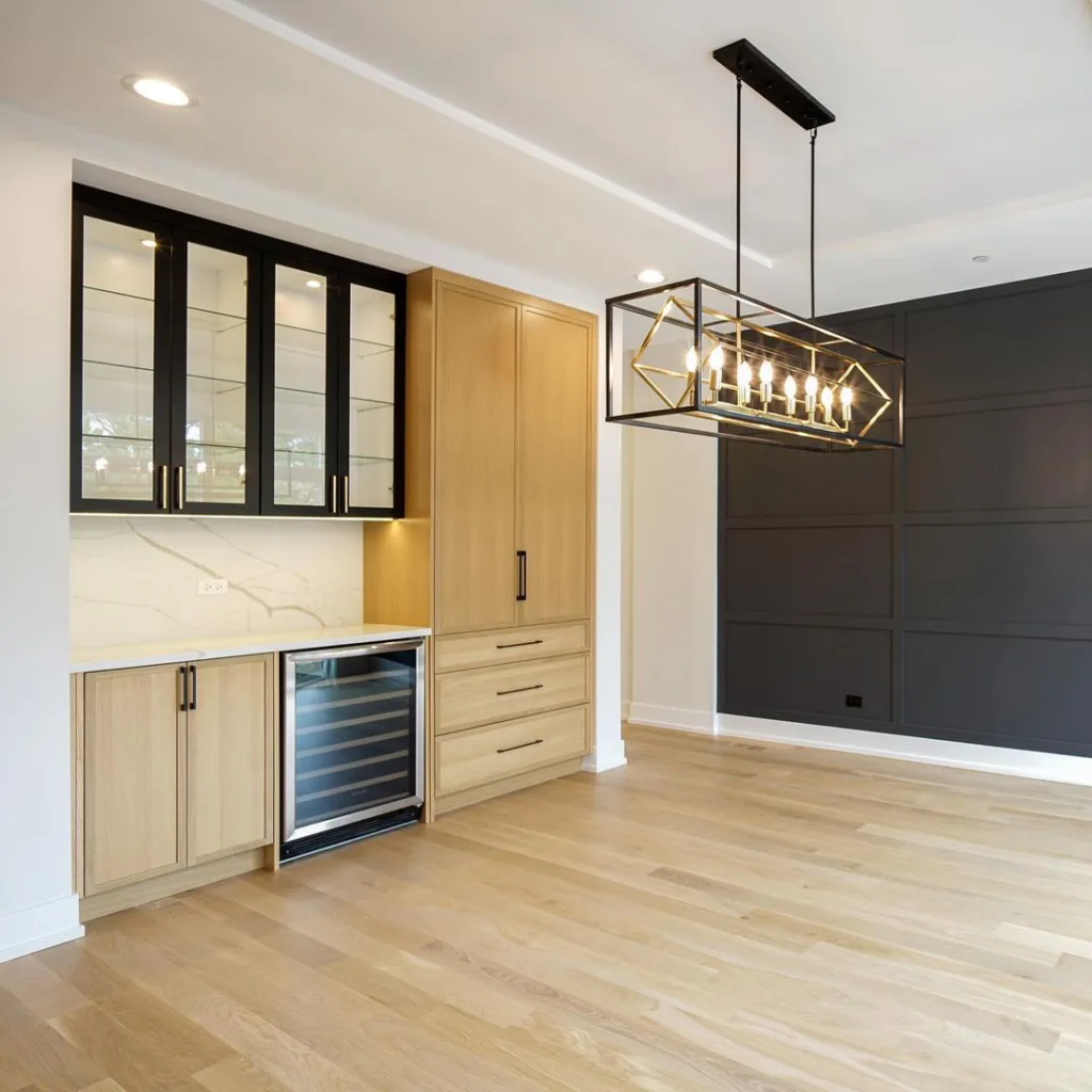 34 Black Accent Wall Ideas For Stunning Contrast 30 A Black Accent Wall With Rectangular Boxes In A Home Bar With White Oak Cabinets And Floors