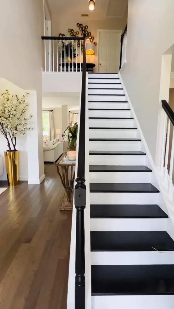 31 Black And White Stairs That Are Sure To Stun 8 Painted Black Stairs With White Railing And The Black Handle In A Room With Plain White Walls