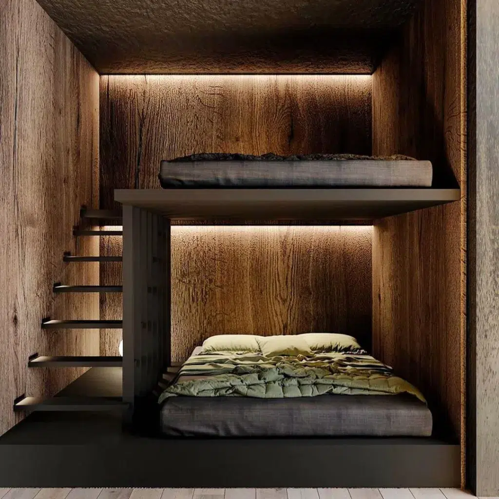 A Modern Bunk Room With Wood Wall Paneling And Two Queen Sized Beds