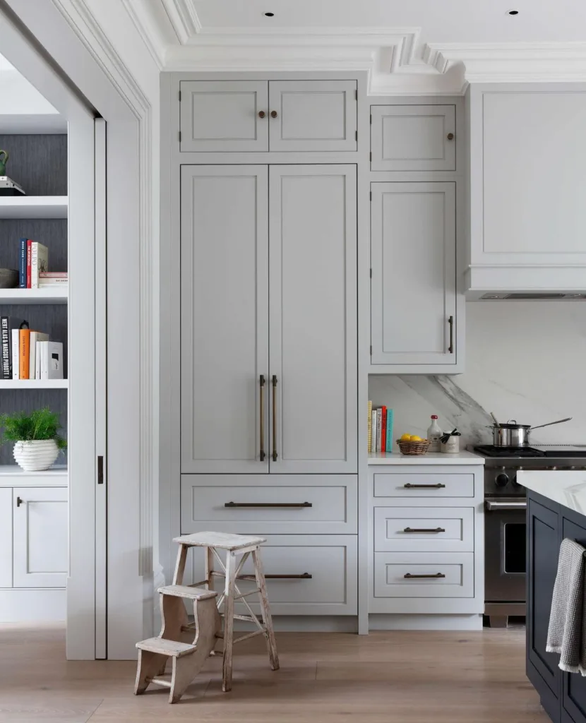 32 Floor To Ceiling Cabinets Ideas To Maximize Storage 26 Open Kitchen With Floor To Ceiling Cabinets With Gas Stive And Fruit Basket.