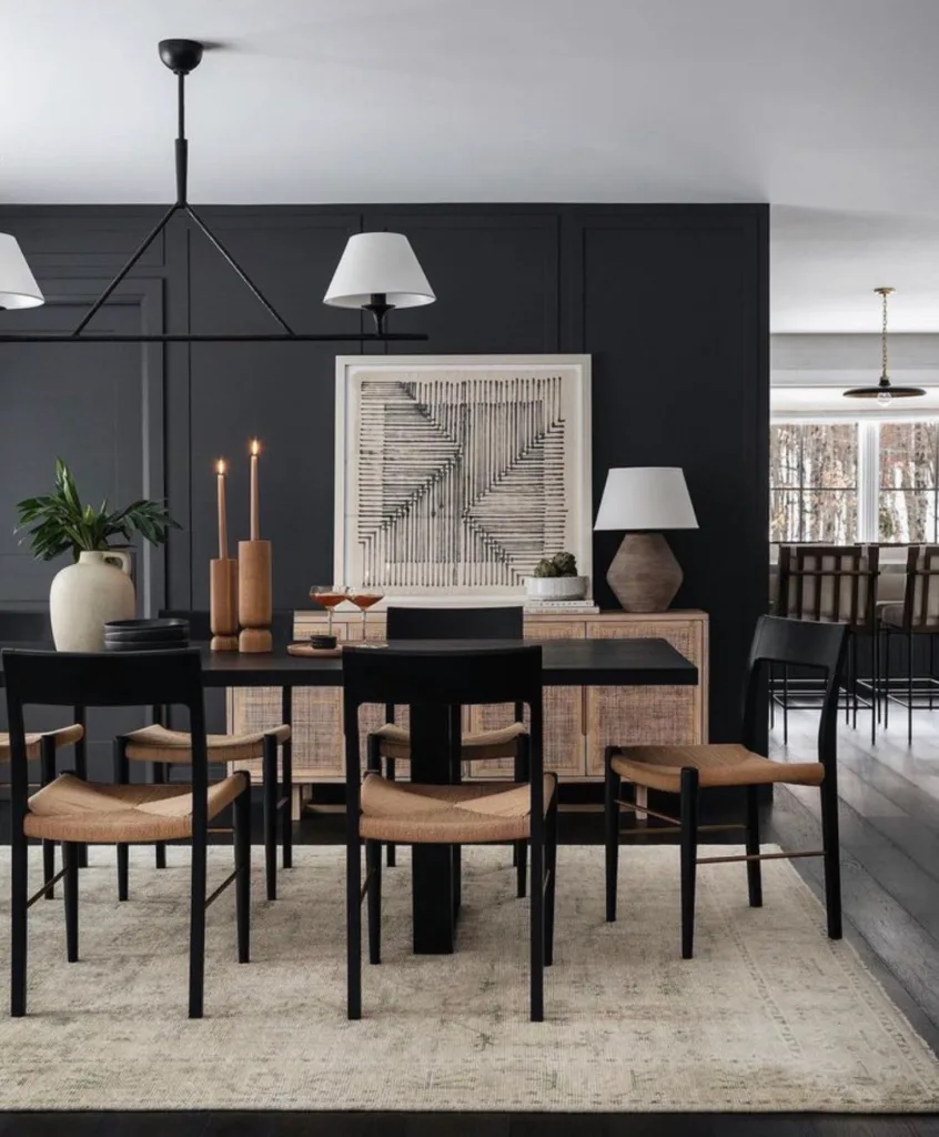 34 Black Accent Wall Ideas For Stunning Contrast 16 A Dark Dining Room With A Black Wall And Black Table And Chairs