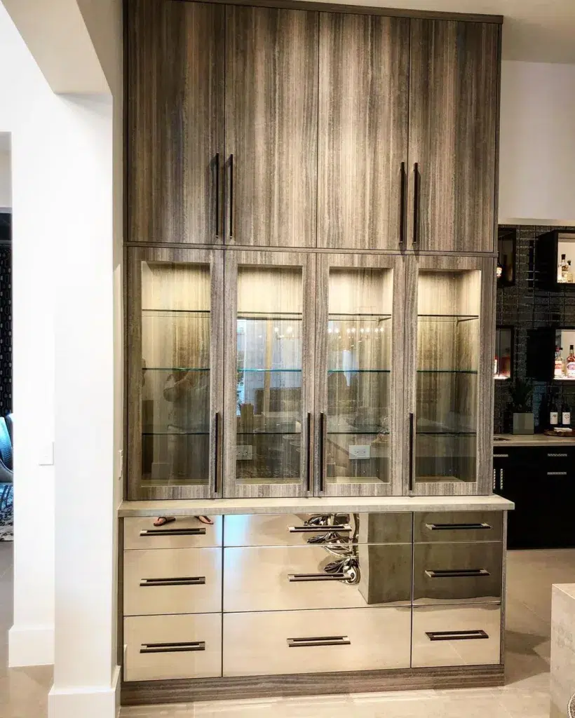 32 Floor To Ceiling Cabinets Ideas To Maximize Storage 21 Stunning Blend Of Chrome Drawers, High-Pressure Laminate, And Interior Lighting Create A Beautiful Visual For This Floor-To-Ceiling China Cabinet In Our Recent Showhome.