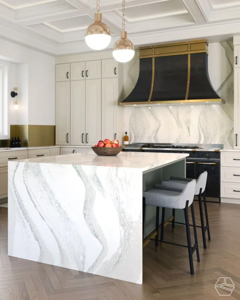 32 Waterfall Kitchen Island Ideas For Inspiration 20 A White And Grey Granite Waterfall Design Island In A White Cabinet Kitchen