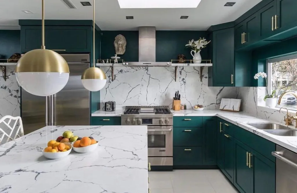 25 Teal Kitchen Cabinets Ideas 21 A Dark Teal Cabinet Kitchen With A Built-In Range And Hood