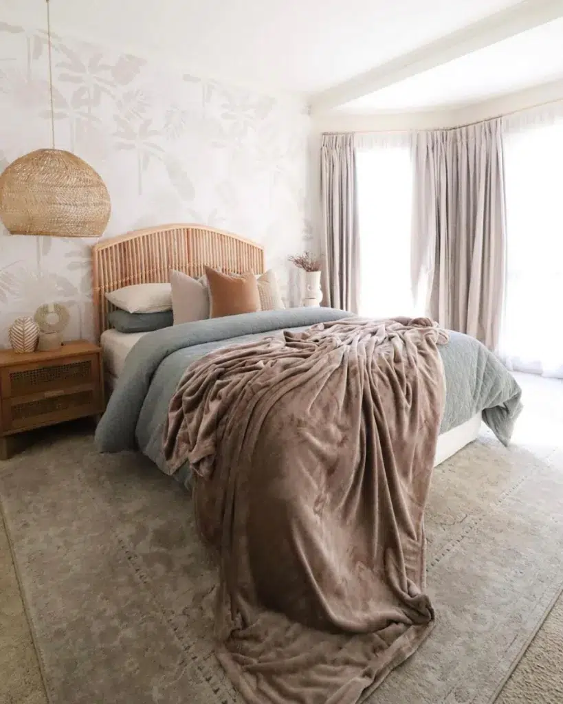 37 Rug Under Bed Ideas For A Stylish Bedroom 16 A Beige Rug Under A Wood Frame Bed With A Blue Comforter And A Brown Blanket
