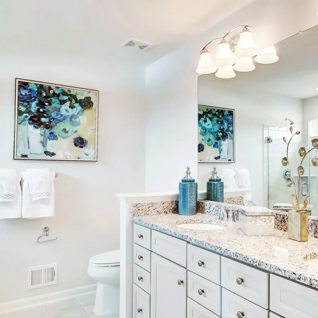35 Bathroom Counter Decor Ideas 15 Blue Accent Decor On The Bathroom Counter Matches A Nearby Painting On The White Walls