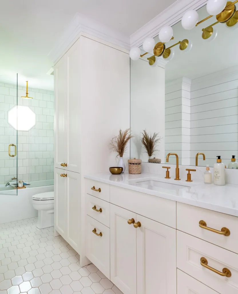 38 Bathrooms With Hexagon Tile Floors 19 Shiplap Wall Detailing And Geometrical Floor Tiles In A Bathroom With Neutral Colored Counter Decor