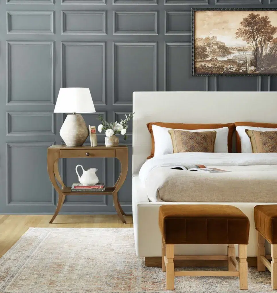 37 Rug Under Bed Ideas For A Stylish Bedroom 3 A Gray Molding Accent Wall Behind A Beige Bed On A Patterned Rug