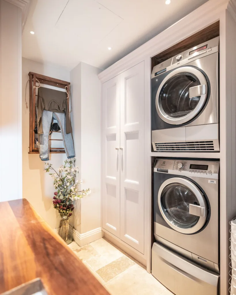32 Floor To Ceiling Cabinets Ideas To Maximize Storage 10 A Laundry Room Is Complete With A Sink, Vast Amount Of Storage Space, And A Great Unit For The Washing Machine And Tumble Dryer.