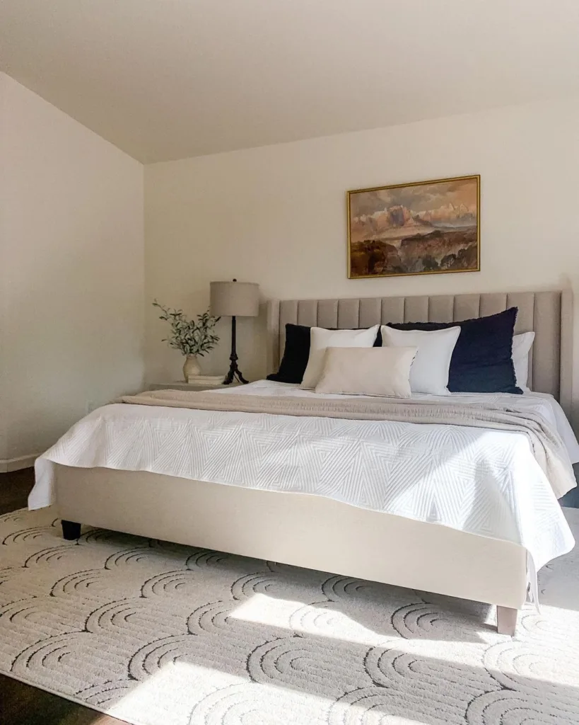 37 Rug Under Bed Ideas For A Stylish Bedroom 32 A Beige Tufted Headboard With A Beige Carpet Under The Bed