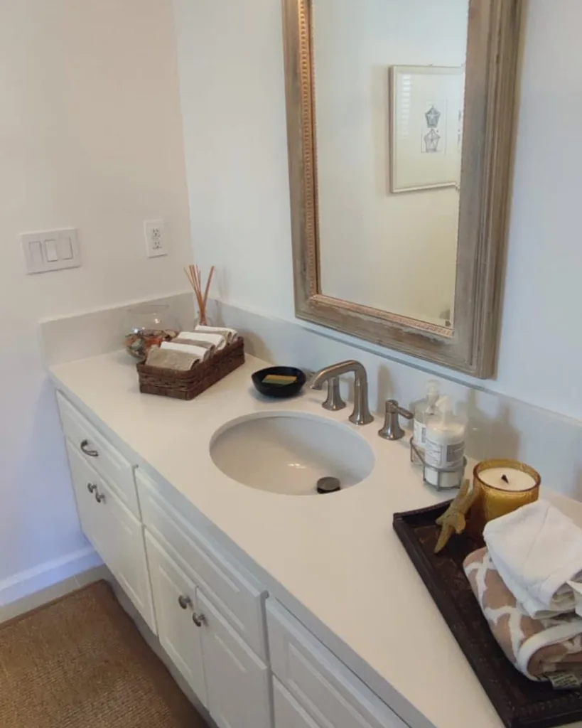 Bathroom Counter Include Towel Basket, Soap Ad The Shampoo. It Include Also One Tray Which Include Candle , Towels And Candles