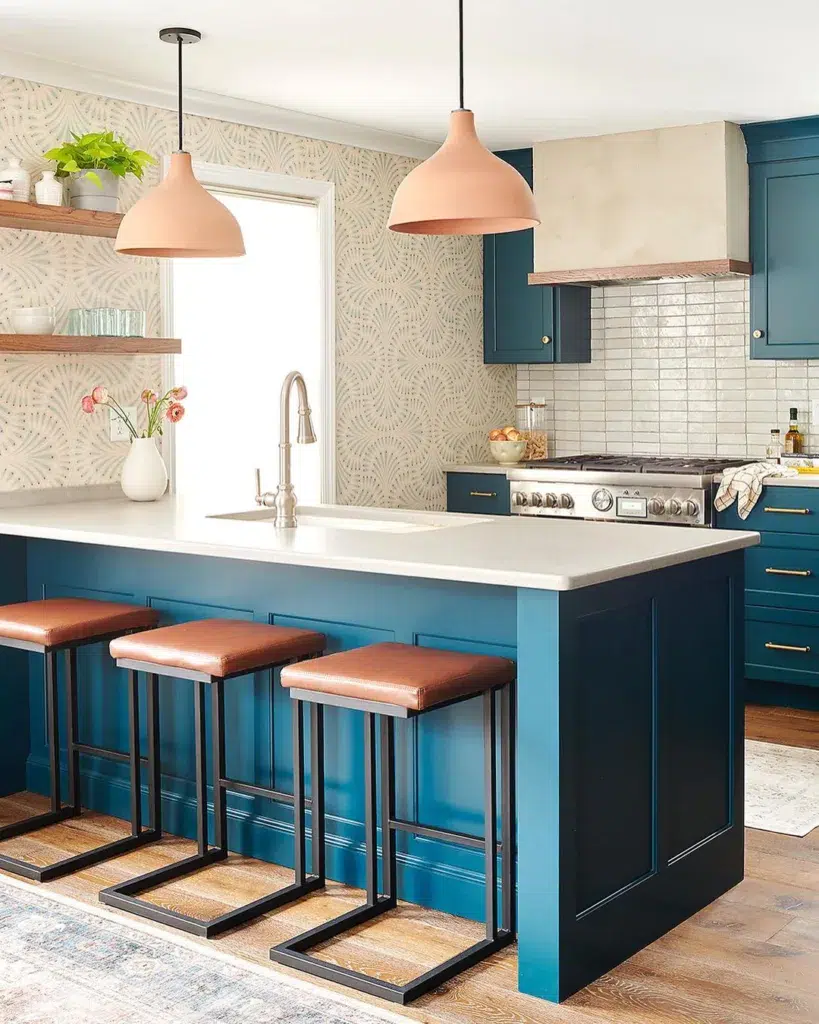 Teal-Themed Kitchen With Modern Cabinetry And Sleek Appliances, Featuring A White Tiled Backsplash