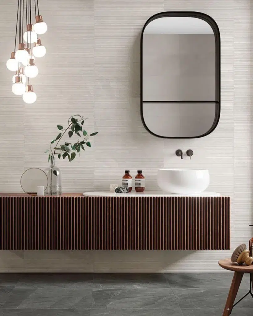 Modern Brown Vanity With Soap Bottles To Accent The Colors In This Minimalist Bathroom