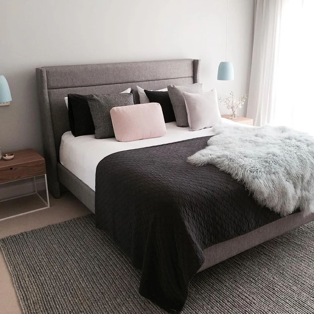 37 Rug Under Bed Ideas For A Stylish Bedroom 7 A Grey Rug Under A Light Grey Bed With Dark Bedding