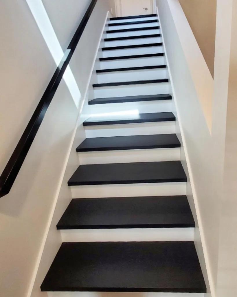 31 Black And White Stairs That Are Sure To Stun 5 Modern Black And White Stairs With White Walls And A Black Railing