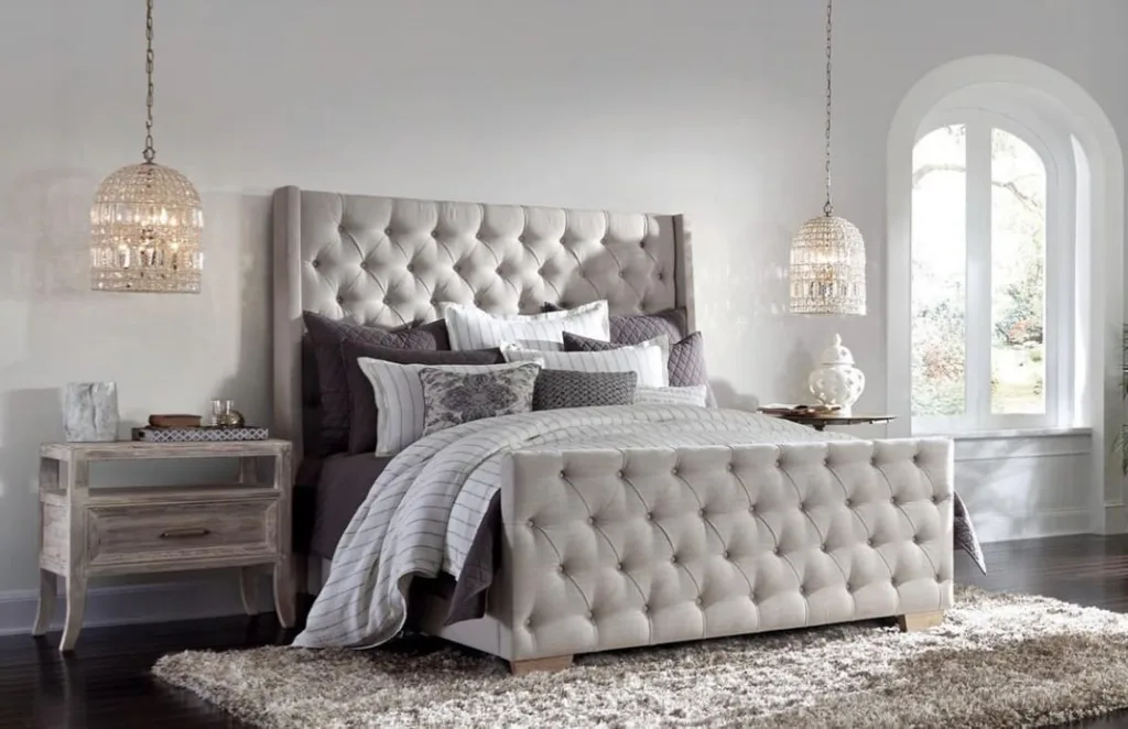 37 Rug Under Bed Ideas For A Stylish Bedroom 9 A Grey Tufted Bed On A Grey Plush Carpet With Pendant Lights Over The Nightstands