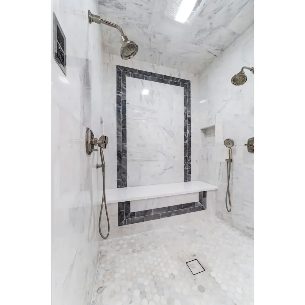 38 Bathrooms With Hexagon Tile Floors 35 A Luxurious And Elegant Bathroom Featuring Fully White Marble Walls And White Hexagon Floors With Black Marble Outlines. The Four Hot Shower Fixtures Add A Modern Touch To The Design And Provide A Spa-Like Experience
