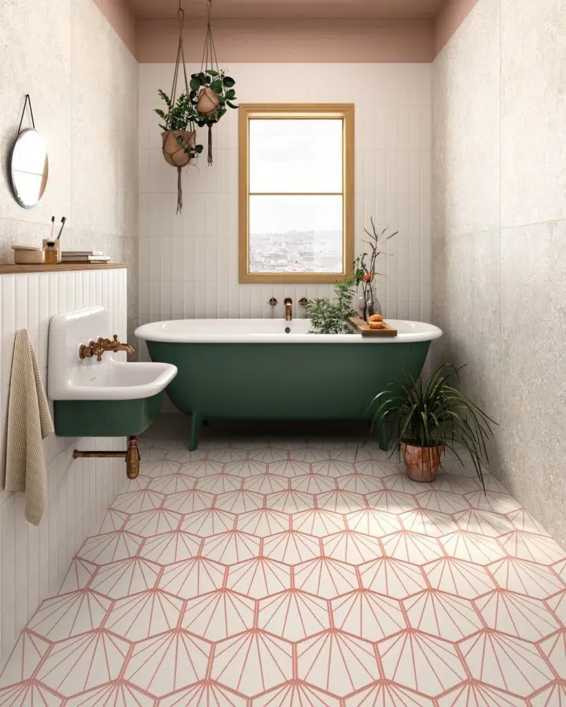 38 Bathrooms With Hexagon Tile Floors 36 A Pink Outline Hexagon Floor Tiles Bathroom With A Green Bathtub And Sink. A Flower Pot Is Placed On The Sink, While A Wooden Window With White Curtains Is Seen In The Background.